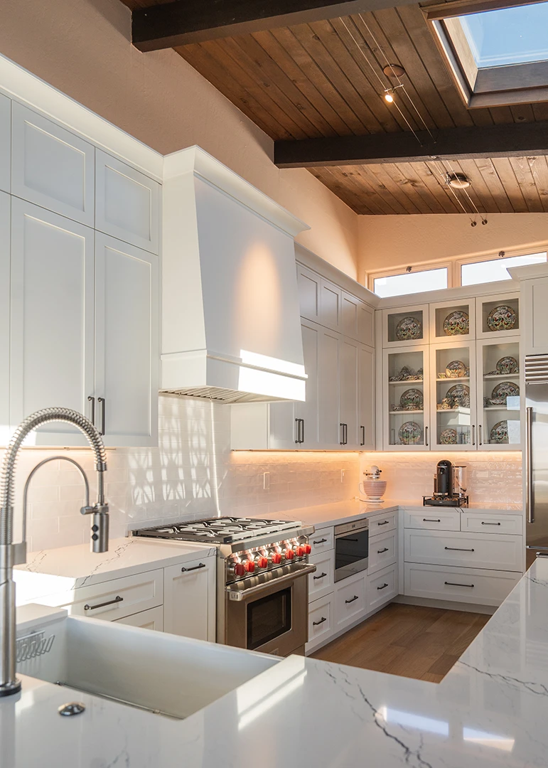 Kitchen remodel design and construction white backsplash with marble